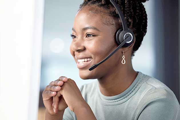 credit union servicing customer service rep wearing headset